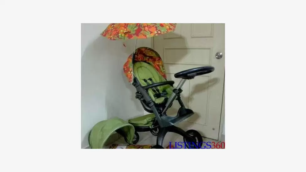 1,250 D Stokke xplory v4 2014 baby stroller including (carry cot car seat) - banjul